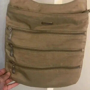 Baggallini crossbody bag with adjustable strap.